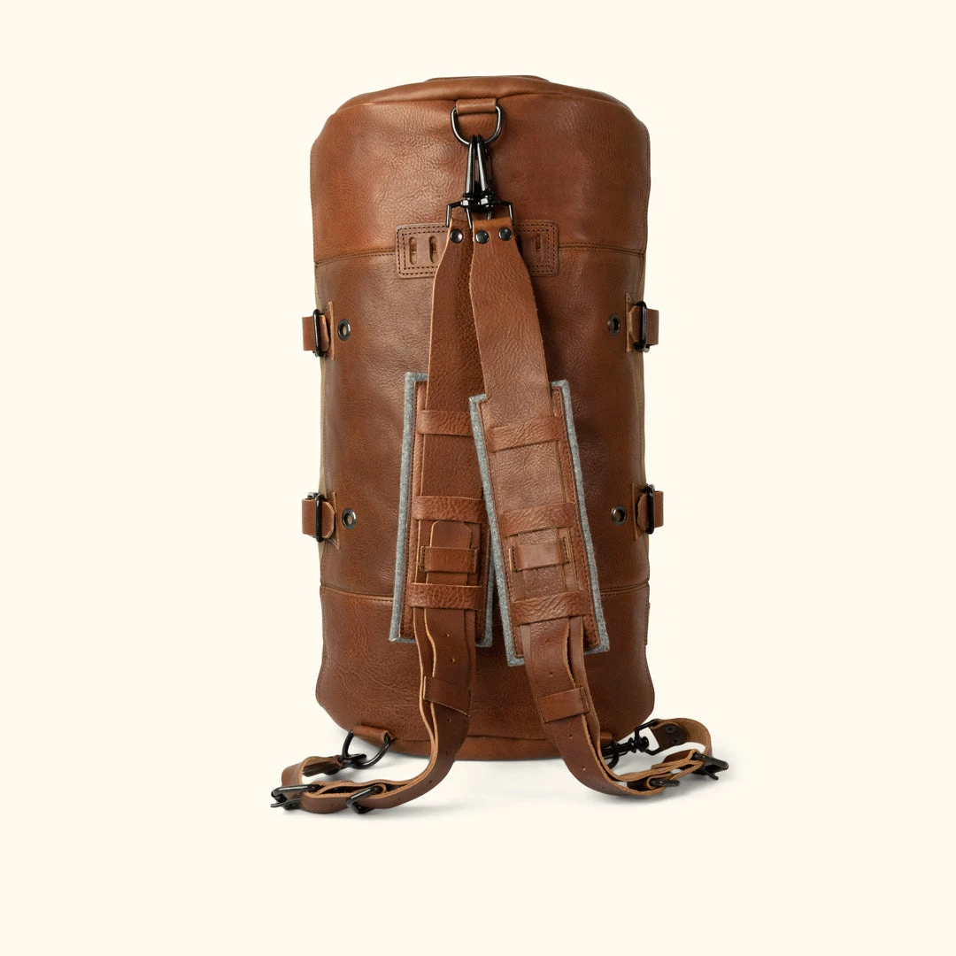 Buffalo Jackson Trading Co. Dakota Waxed Canvas Duffle Bag/Backpack | Field Khaki W/ Chestnut Brown Leather