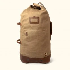 Buffalo Jackson Trading Co. Dakota Waxed Canvas Military Sea Bag Backpack | Field Khaki W/ Chestnut Brown Leather