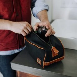 Buffalo Jackson Trading Co. Dakota Waxed Canvas Dopp Kit Toiletry Bag | Navy Charcoal W/ Saddle Tan Leather