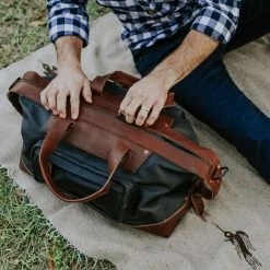 Buffalo Jackson Trading Co. Dakota Waxed Canvas Weekend Bag | Navy Charcoal W/ Chestnut Brown Leather Leather Duffle Bags 21 Buffalo Jackson Trading Co. Dakota Waxed Canvas Weekend Bag | Navy Charcoal W/ Chestnut Brown Leather Leather Duffle Bags
