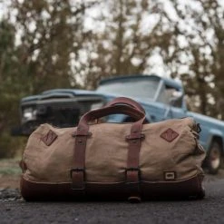 Buffalo Jackson Trading Co. Dakota Waxed Canvas Duffle Bag/Backpack | Field Khaki W/ Chestnut Brown Leather