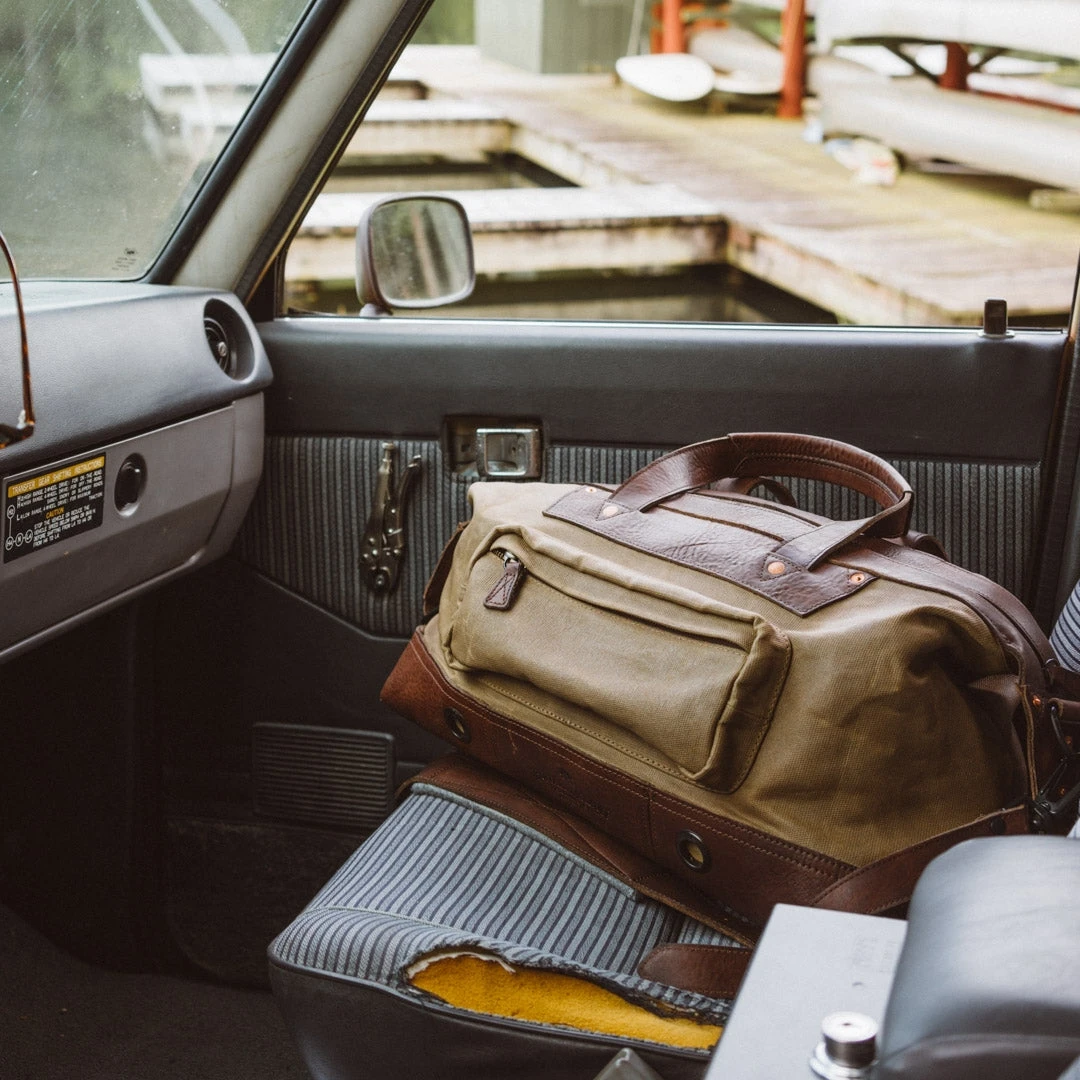 Buffalo Jackson Trading Co. Leather Duffle Bags Dakota Waxed Canvas Weekend Bag | Field Khaki W/ Chestnut Brown Leather Buffalo Jackson Trading Co. Leather Duffle Bags Dakota Waxed Canvas Weekend Bag | Field Khaki W/ Chestnut Brown Leather