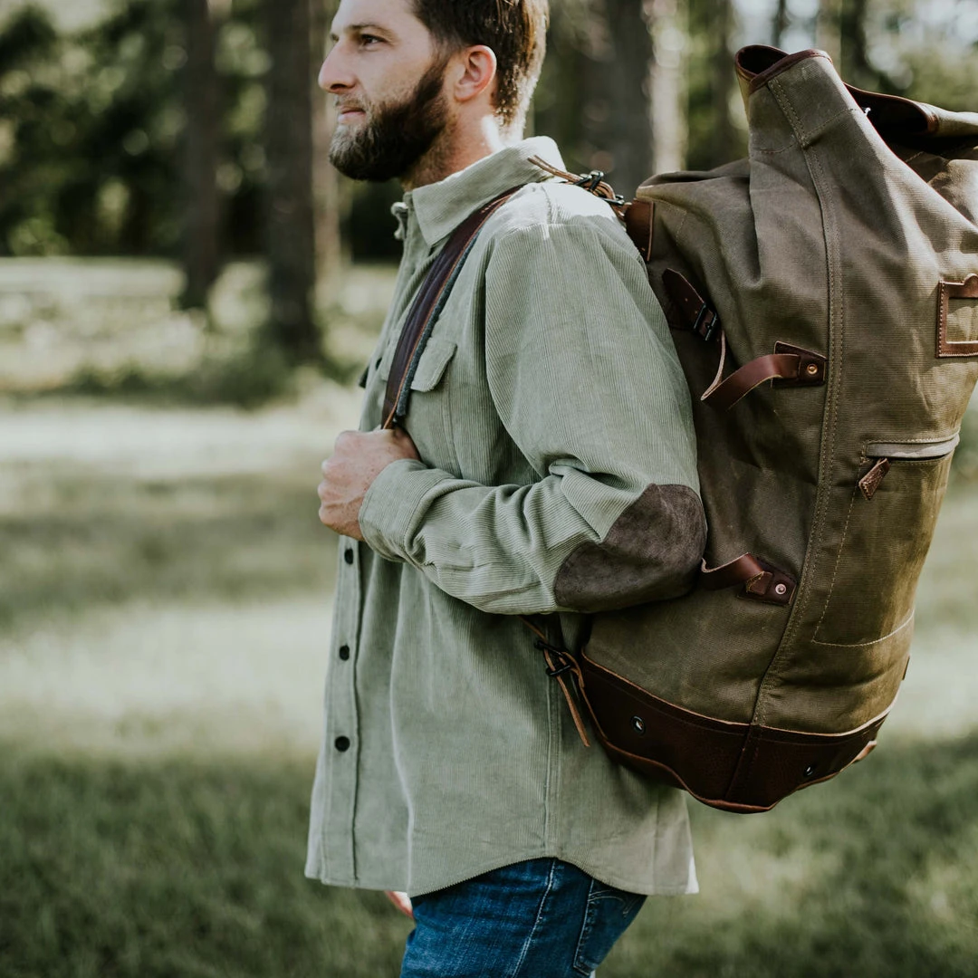 Buffalo Jackson Trading Co. Dakota Waxed Canvas Military Sea Bag Backpack | Field Khaki W/ Chestnut Brown Leather Buffalo Jackson Trading Co. Dakota Waxed Canvas Military Sea Bag Backpack | Field Khaki W/ Chestnut Brown Leather