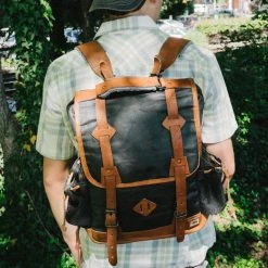 Buffalo Jackson Trading Co. Dakota Waxed Canvas Commuter Backpack | Navy Charcoal W/ Saddle Tan Leather Leather Backpacks